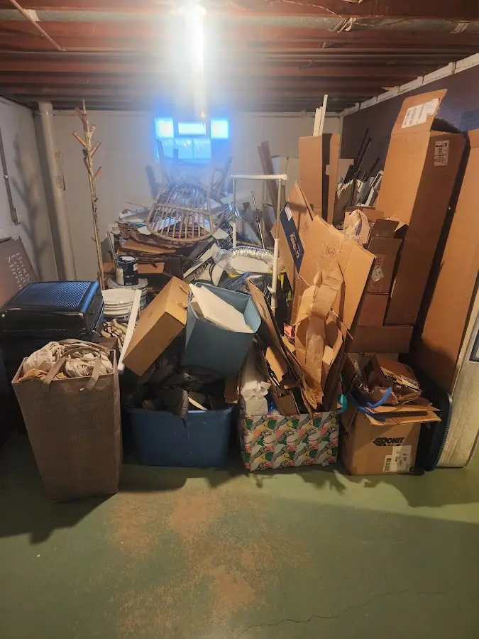 Roll-off dumpster container at job site for 2 Yard Dumpster Rental in Forks